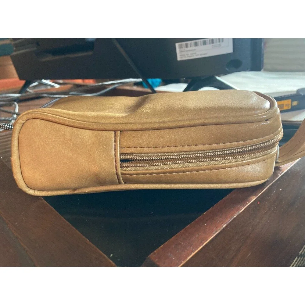 Kodak 600 camera with vintage leather camera case